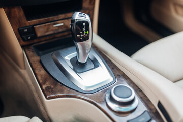 Modern car gearbox handle stick close up