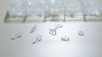 A pile of nose pads in glasses. Glasses repair service