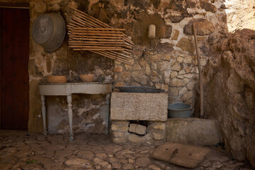 rural location with tools, carts and utensils typical of Sicilian peasant life