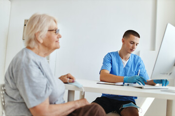 elderly woman patient at the doctor's appointment health care