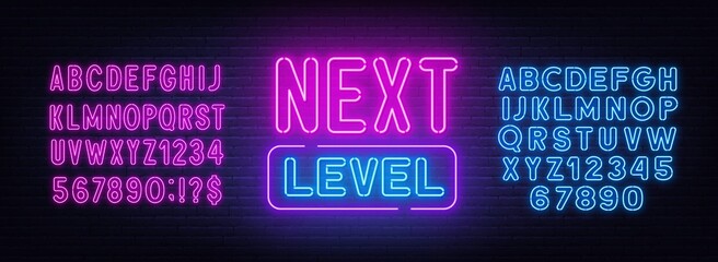 Next level neon sign on brick wall background.