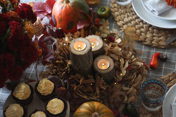 Festive autumn table setting with pumpkin