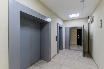 Russia, Moscow- May 03, 2020: interior room public place, house entrance. doors, walls, staircase corridors