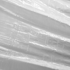 Reflected light and shadow on creases and folds in plastic sheeting