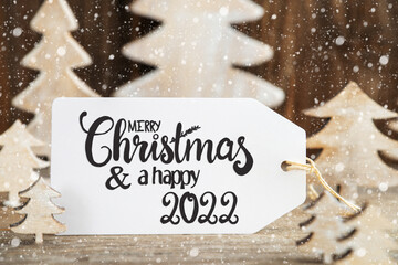 Obraz na płótnie Canvas Christmas Tree, Label With Merry Christmas And Happy 2022, Snowflakes