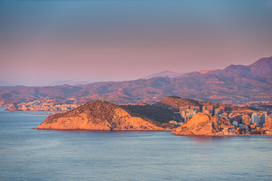 Panoramic view of rocky coast in Costa Blanca Alicante Mediterranean Sea at sunrise. Benidorm Vila Joyosa Cala Finestrat