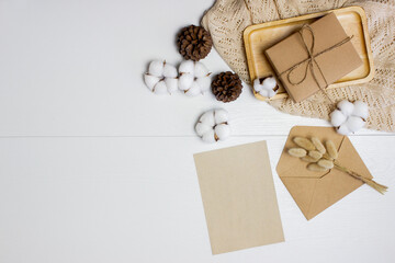 Vintage letter with box and flowers over the white background.