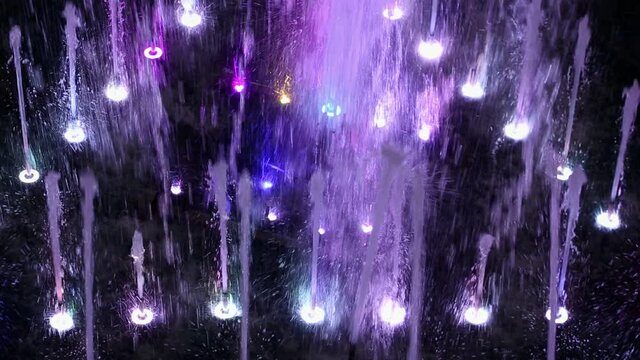 Water fountain with changeable multi-colored illumination.