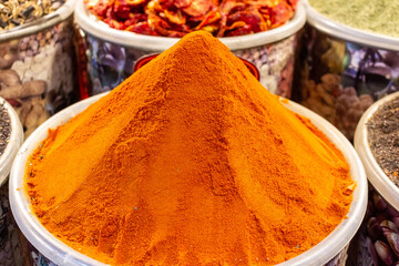 Shot of powdered pepper in a spice bazaar in Istanbul. Selective focus on foreground