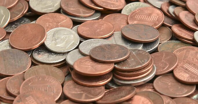 A  mound of U.S. coins on a table