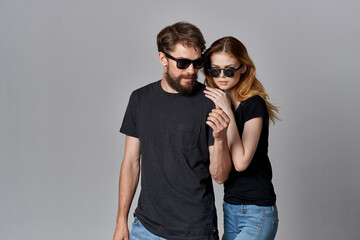 a young couple friendship communication romance wearing sunglasses studio lifestyle