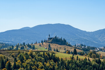 View of Tihuta Pass (Pasul Tihuta) on a sunny autumn afternoon