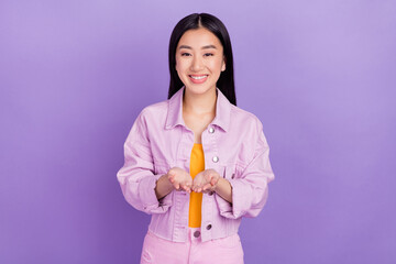 Photo of cute young brunette lady ask wear pink jacket isolated on violet color background