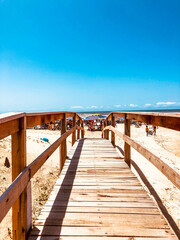 wooden bridge over the sea
