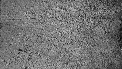 the uneven surface of a concrete wall for the rough texture collection. textured background for creative design elements.