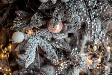 Decorated Christmas tree on blurred, sparkling and fairy background