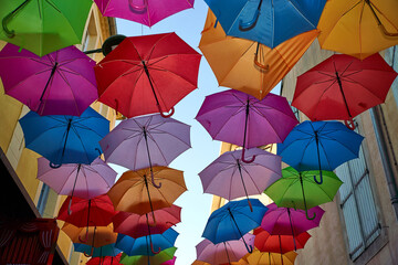 Fototapeta na wymiar Swarm of umbrellas