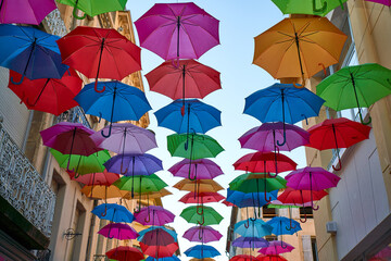 Fototapeta na wymiar Swarm of umbrellas