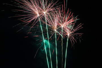 Celebratory fireworks. Fireworks at night against a dark sky.