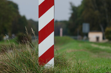 STATE BORDER POST - The Polish border is marked with posts in national colors 
