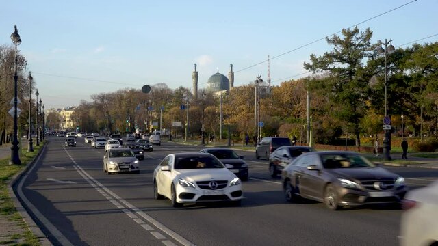 
Russia Saint Petersburg Car traffic. Kamennoostrovsky prospect, Mosque in the background. 6/10/2021 am 17.00 Editorial video.