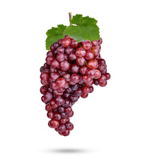 Fresh red grape with leaves isolated on white background