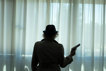 Spy thriller lady with pistol