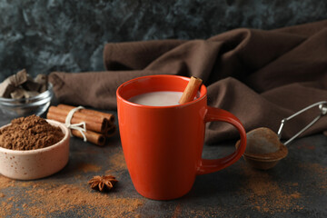 Fototapeta na wymiar Concept of tasty drink with cocoa on dark table