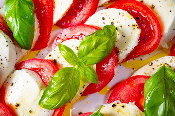 Tomato with mozzarella and basil