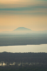 Minimalist pastel sunset over a mountain silhouette © joangasconcomas