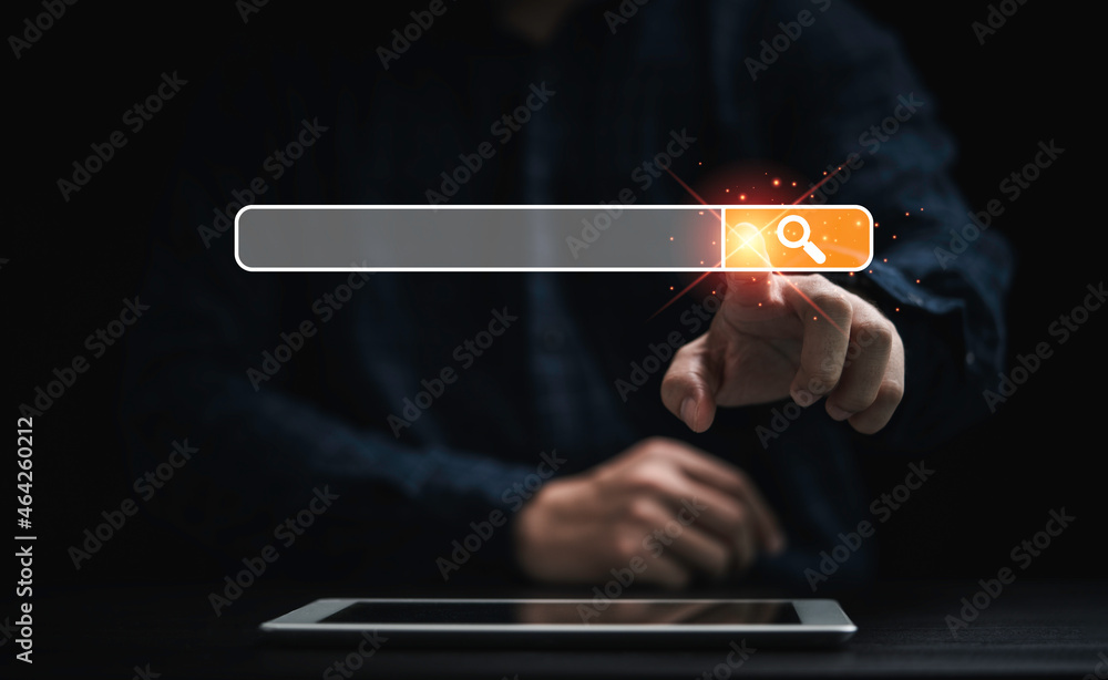 Poster businessman using tablet and touching to search engine bar for searching information network concept