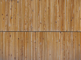 background of vertically arranged wooden bars