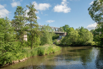 Fototapeta na wymiar Eisenbahnbrücke bei Fulda auf dem Fuldaradweg