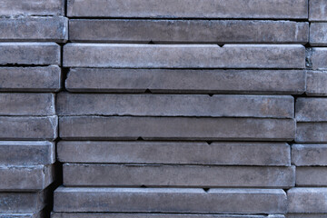 Paving slabs in the construction market on the street, lay in layers. Close up