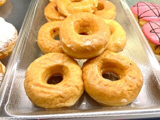 Close-up shot of Glazed confectionery, a dessert made from flour and sugar. It is commonly consumed by the general public. It smells delicious and colorful.