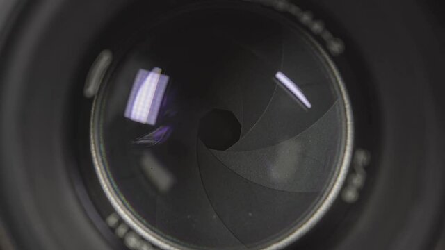 Diaphragm blades of the fixed lens opening and closing aperture f-stop 2