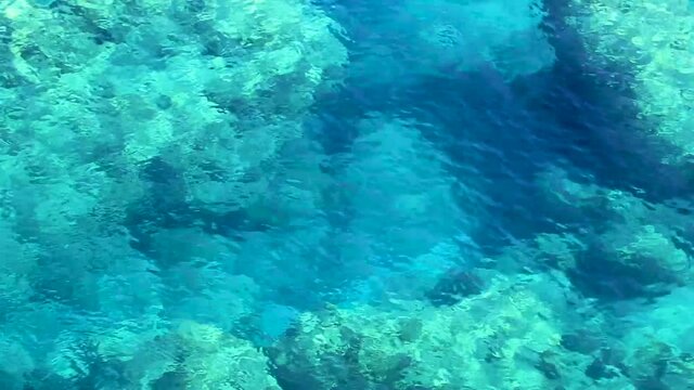 Anthony Quinn Bay with turquoise clear water and underwater view in Faliraki on Rhodes Greece.