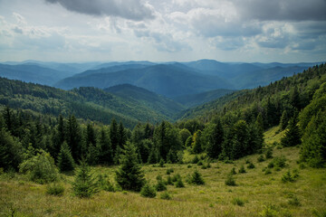 dramatic beautiful Carpathian Mountains nature landscape photography from above with horizon view of sun light rays