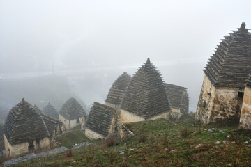 Dargavs, North Ossetia-Alania, Russia. City of the dead, ancient necropolis in the mountains of North Caucasus.  - 464269268