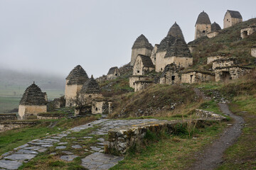Dargavs, North Ossetia-Alania, Russia. City of the dead, ancient necropolis in the mountains of North Caucasus.  - 464269271
