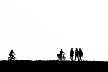 walkers and cyclist in black and white