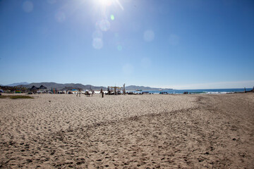 beautiful beach, blue sky with sun shine, cool waves, sand ocean view. mexico, california,.