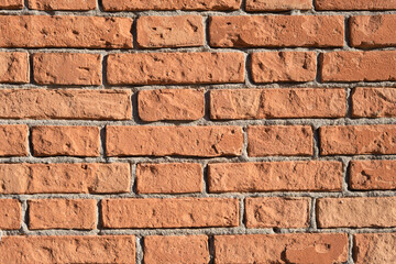 Vintage, old orange brick wall texture, flat lay, top view background.