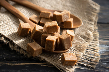 brown sugar cubes on a wooden