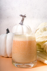 Autumn warm drinks. Homemade spicy dairy pumpkin creamer made from cream or milk and pumpkin puree...
