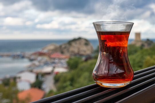 Tea cup armudas, traditional Turkish tea against background of Istanbul. traditional authentic glass cup - armudu. Special glasses of Armuda. Special glasses of Armuda