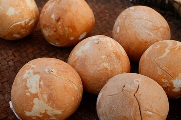 The coconut meat is peeled and ready to be cooked. Peeled coconut at traditional market