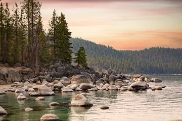 Printed roller blinds Chocolate brown landscape image of a rocky shoreline along Lake Tahoe, with still water, against a serene dusk sky