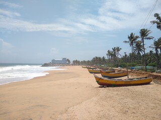 Fototapeta na wymiar boats on the beach, Kollamkode, Kanyakumari district, Tamilnadu