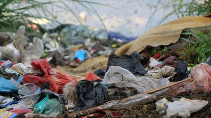River that is polluted with various garbage and trash, Polluted rivers, photography